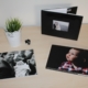 A table with family photos and a photo book